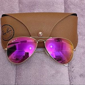Pink Rayban aviator sunglasses.